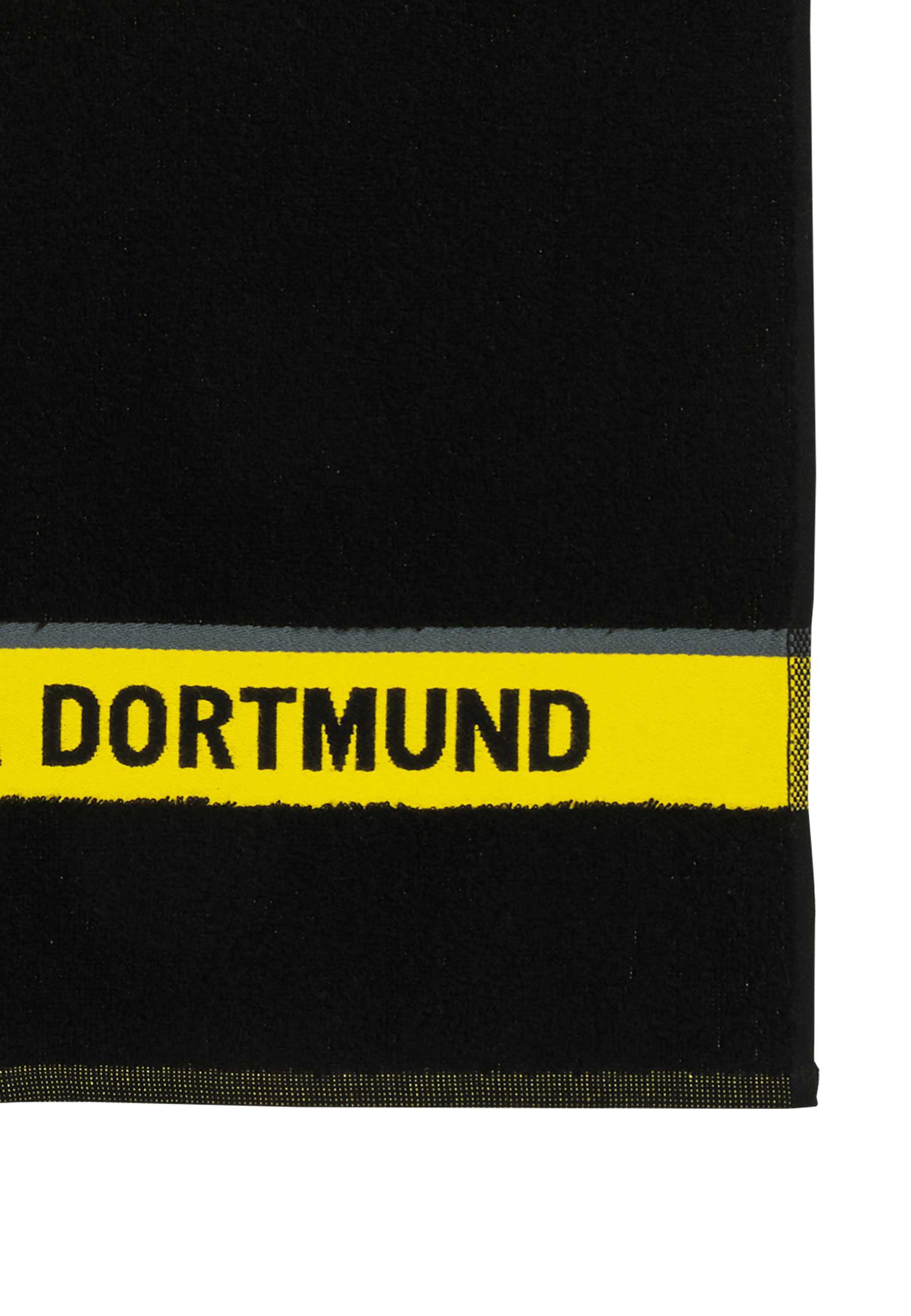 Detailansicht des BVB-Handtuchs Emblem 50x100 cm in schwarzgelb mit gelbem Streifen und schwarzem "DORTMUND"-Schriftzug nahe dem Rand.