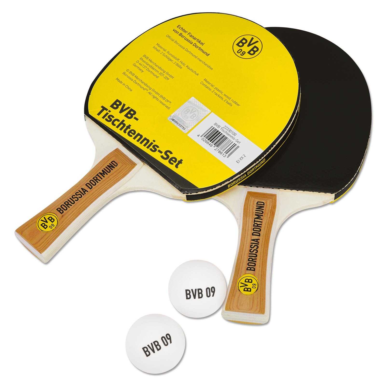 Vorderansicht des BVB Tischtennis-Sets mit zwei schwarzgelben Schlägern, BVB-Emblem auf den Griffen und zwei weißen Bällen mit BVB 09 Schriftzug.