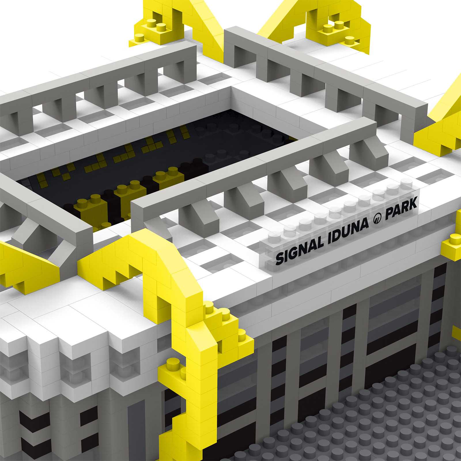 Detailansicht des BVB Signal Iduna Park Bausatz (mini) aus weißen, grauen und gelben Bausteinen mit Schriftzug SIGNAL IDUNA PARK auf der Tribüne.