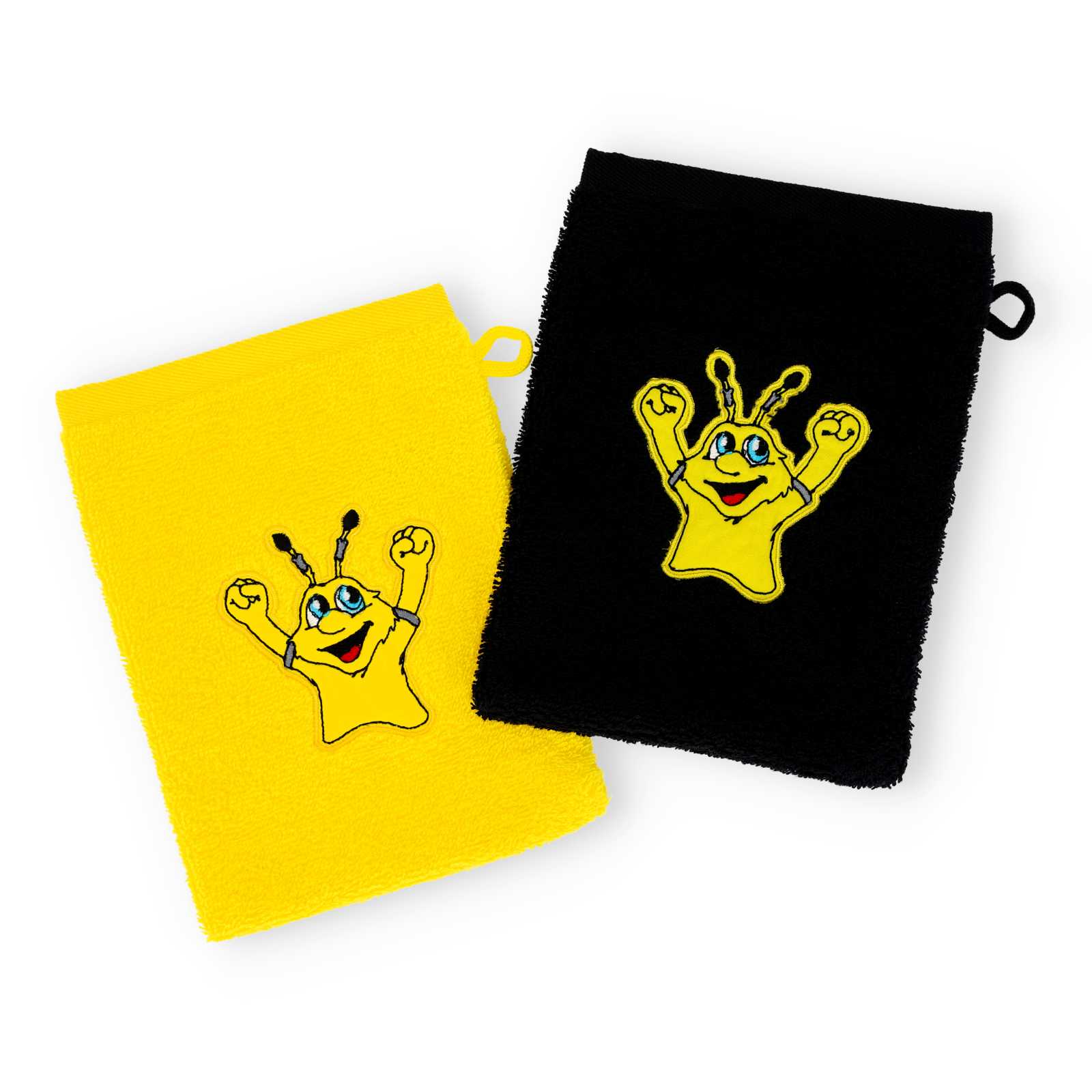 Vorderseite der beiden BVB-Waschlappen, einer gelb und einer schwarz, mit fröhlichem BVB-Maskottchen EMMA.