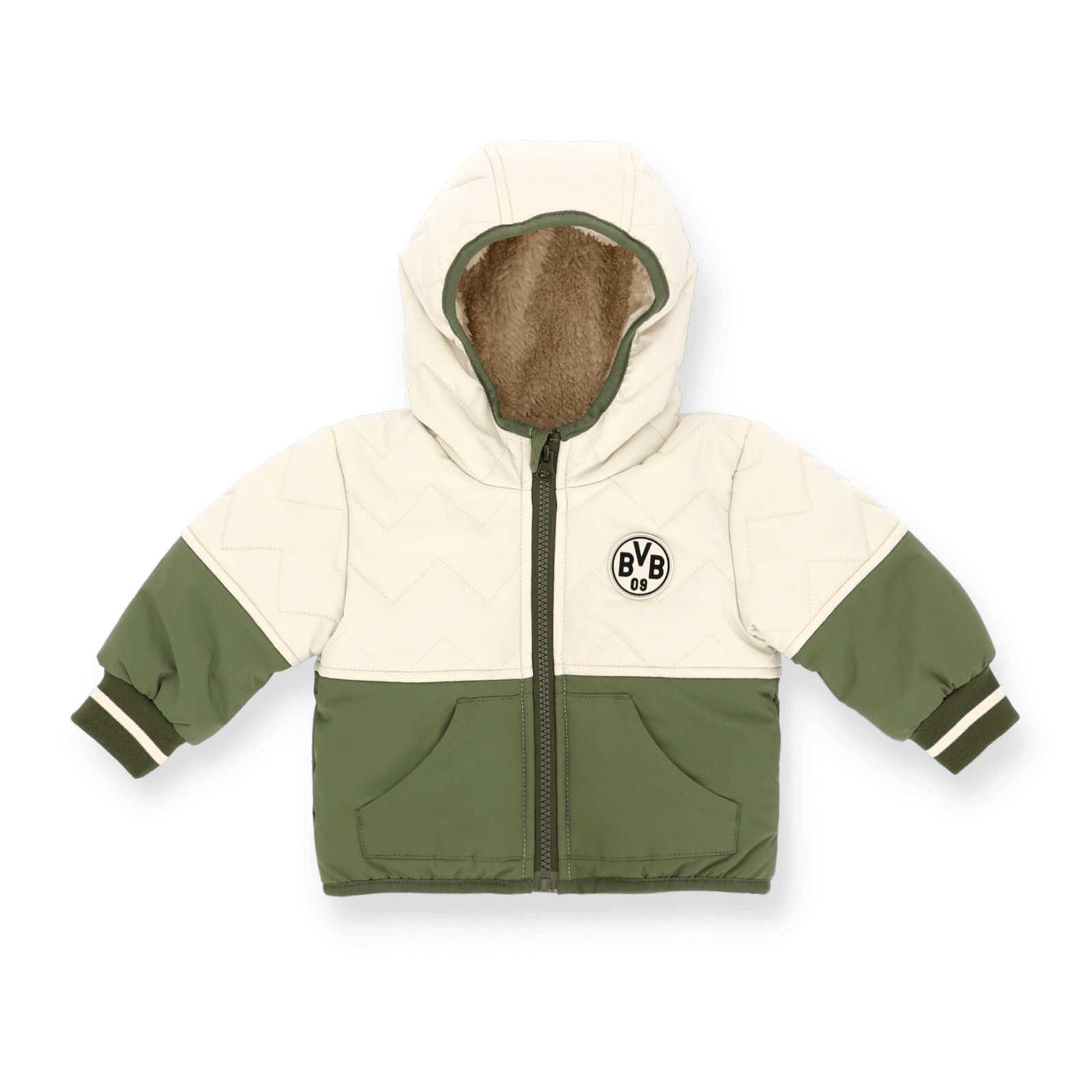 Grünweiße Babyjacke liegt ausgebreitet auf dem Boden und ist aus der Vogelperspektive zu sehen.
