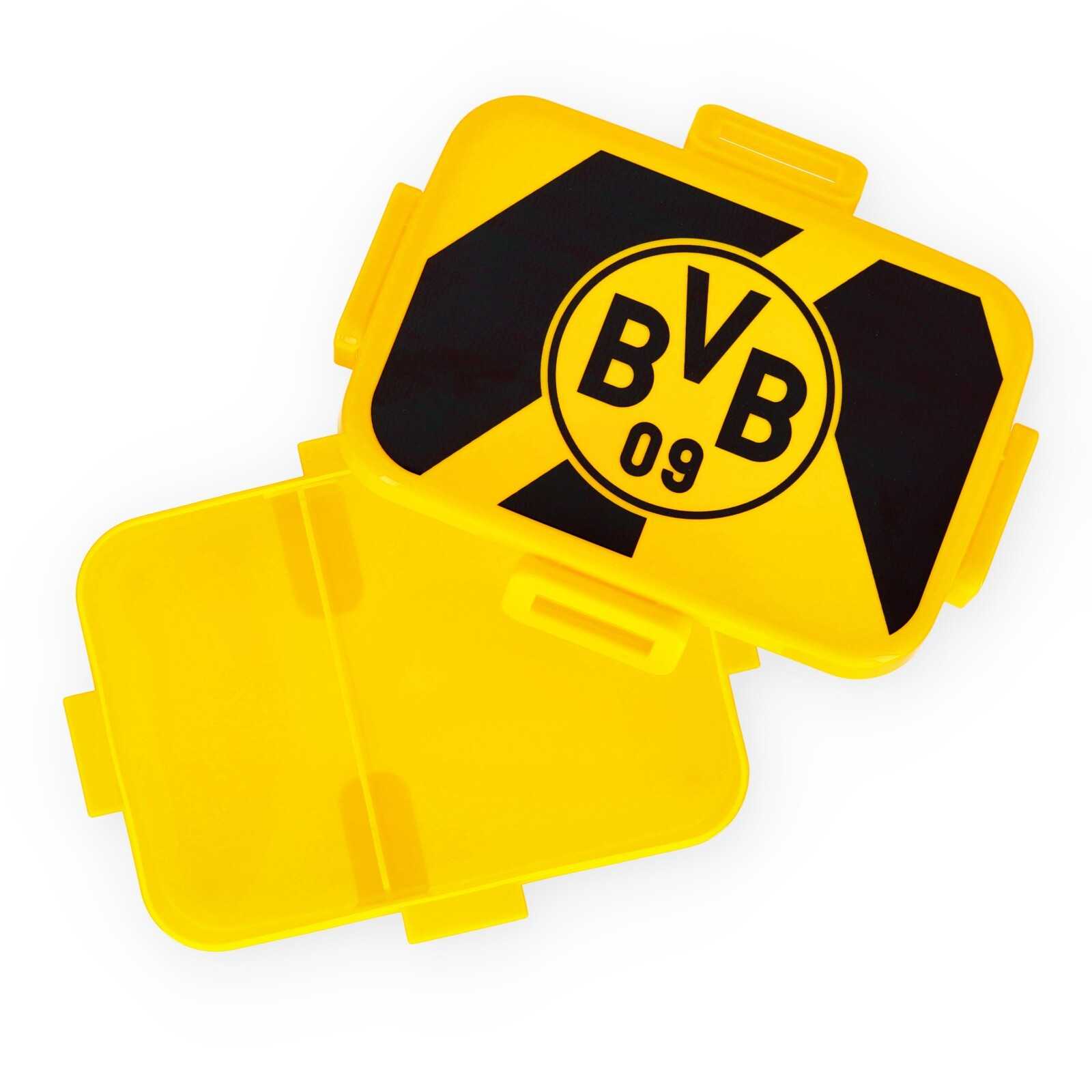Die gelbe Brotdose geöffnet von oben mit BVB-Emblem und schwarzgelben Muster auf dem Deckel